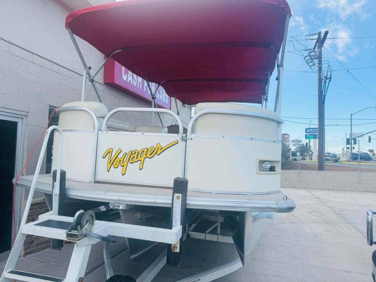 2005 White Voyager , located at 2190 Hwy 95, Bullhead City, AZ, 86442, (928) 704-0060, 0.000000, 0.000000 - 2005 Voyager Tritoon boat. red/white. double bimini tops. recently serviced. low hours. 215 hours. 5.0 220 hp mercruiser. 2 gas tanks. 2 new batteries. full winter cover . - Photo#2